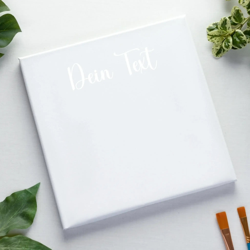 Weisse foto-leinwand mit dein text in feiner cursive gravur auf keilrahmen personalisiertes fotogeschenk 45x45 cm
