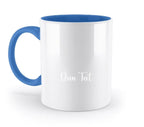 Weiße keramik foto-tasse mit blauem griff und innenfläche personalisiert mit weißem dein text im natur-cursivschriftstil
