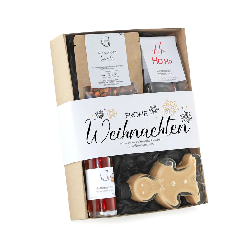 Frohe weihnachten geschenkset s mit weißem band und gold schneeflocken enthält gingerman bonbon hüttenzaubler likör und feuerzangenbowle treats