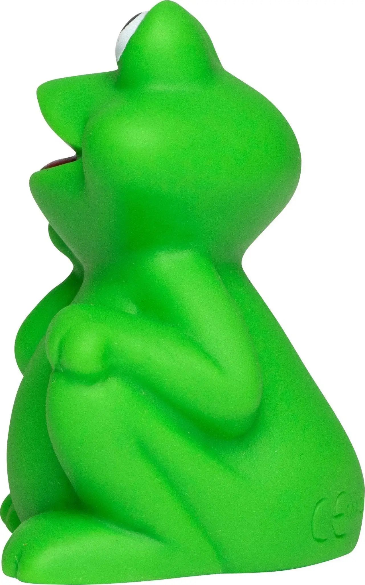 Grüner gummifrosch badetier mit weißem auge und offenem mund aus der serie quietsche-frosch badeente