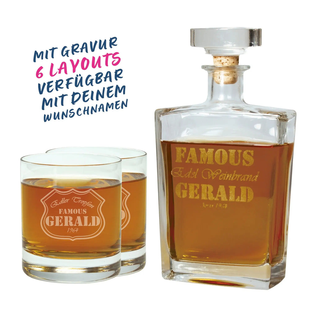 Clear glass whiskey decanter with gold engraved text and cork stopper plus two matching tumblers in gift set