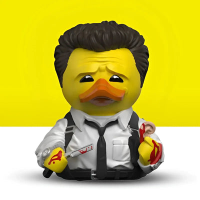 Gelbe gummiente im geschenkset reservoir dogs als detektiv mit schwarzem haar weißem shirt und blutiger messerfigur