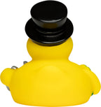 Gelbe quietsche-ente mit schwarzem zylinder als glücksbringer badeente aus gummi