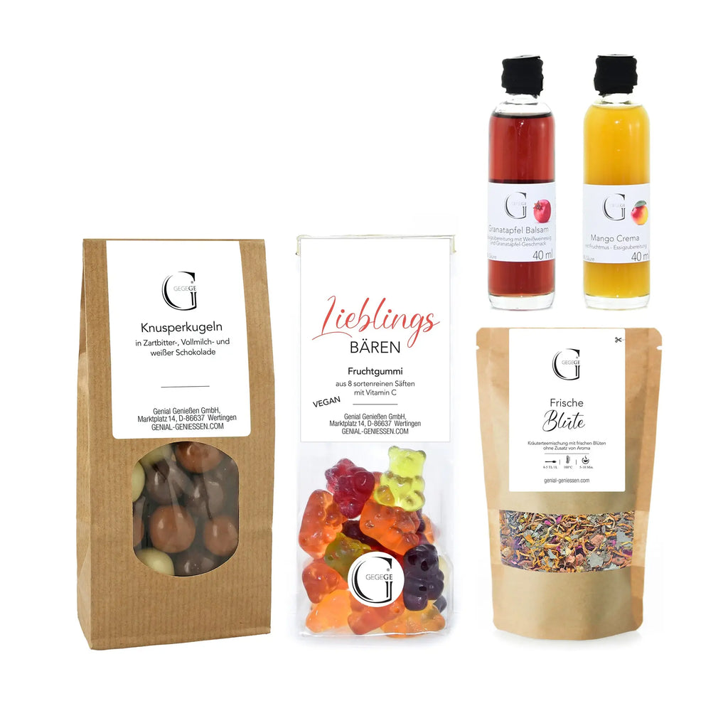 A clear plastic bag of colorful vegan bear-shaped fruit gummies labeled lieblings bären in the hobby-set fahrradspaß präsentkorb