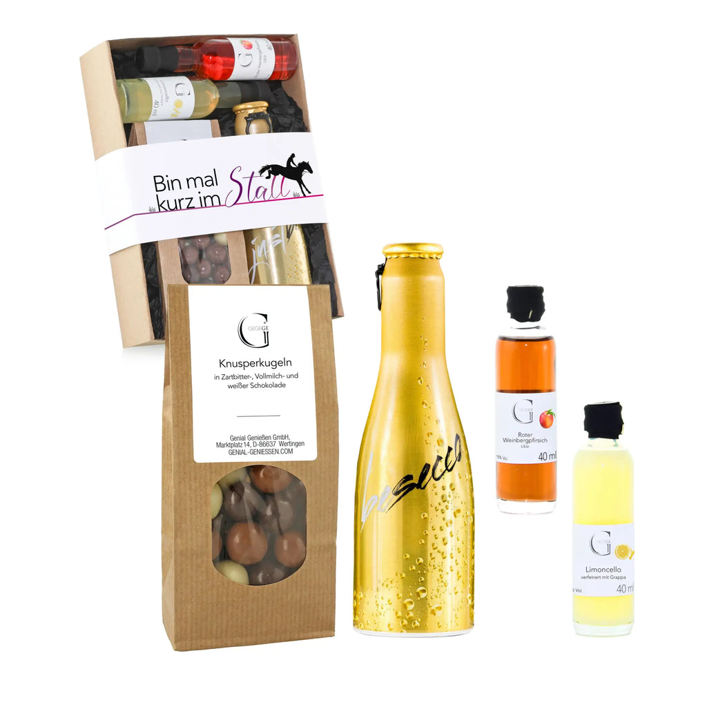 Goldene metallicflasche mit mascio schriftzug und kondenswasser aus hobby set reiter präsentkorb bin mal kurz im stall