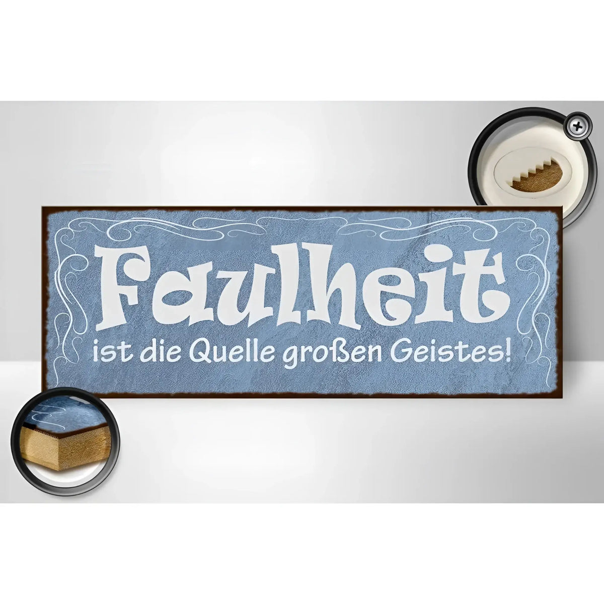 Blaues holzschild 27x10cm mit weißer verzierter schrift faulheit ist die quelle großen geistes und braunem rahmen