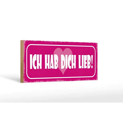 Ein pinkes holzschild 27x10cm mit weißem spruch ich hab dich lieb und herz deko mit used look