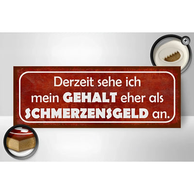 Rotes rechteckiges metallschild mit weißem Text derzeit sehe ich mein gehalt eher als schmerzensgeld an 27x10cm
