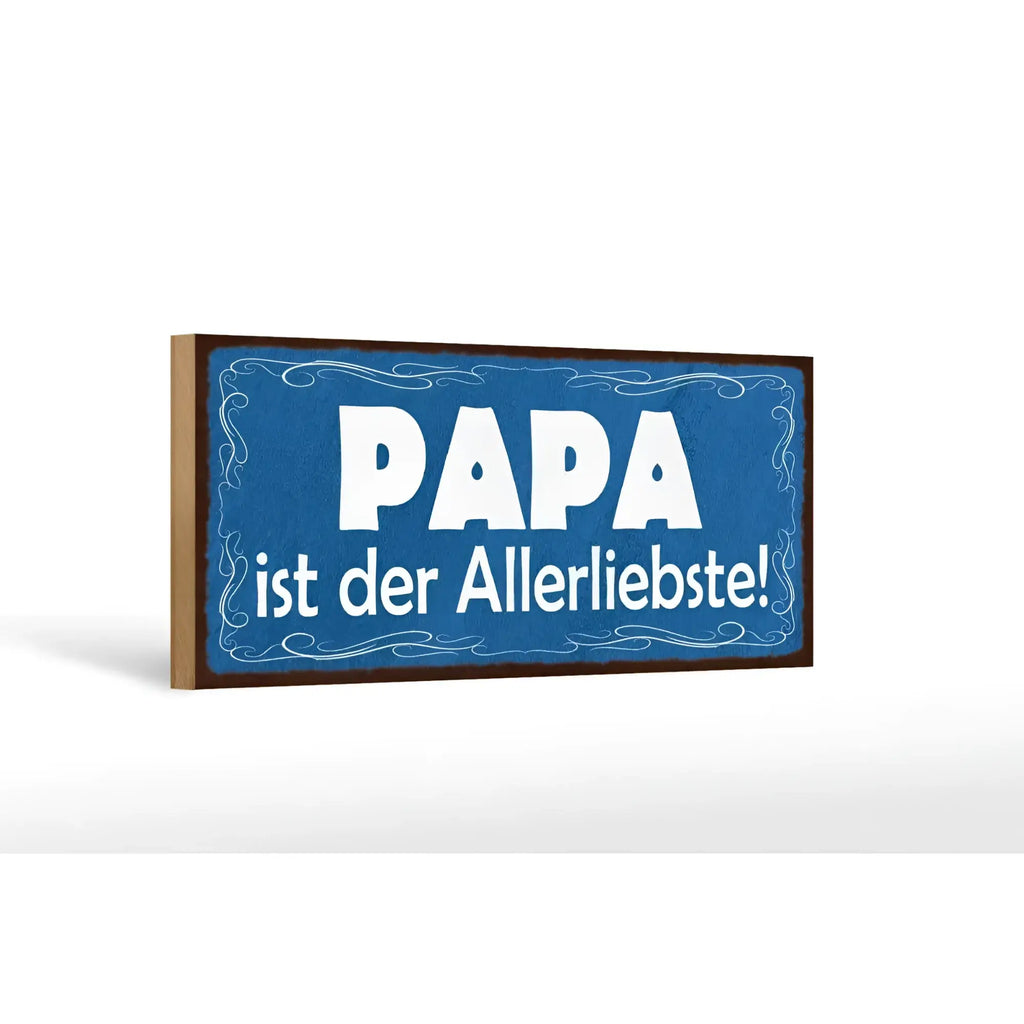 Blaues rechteckiges holzschild mit weißem text papa ist der allerliebste und dekorativen wirbeln am rand