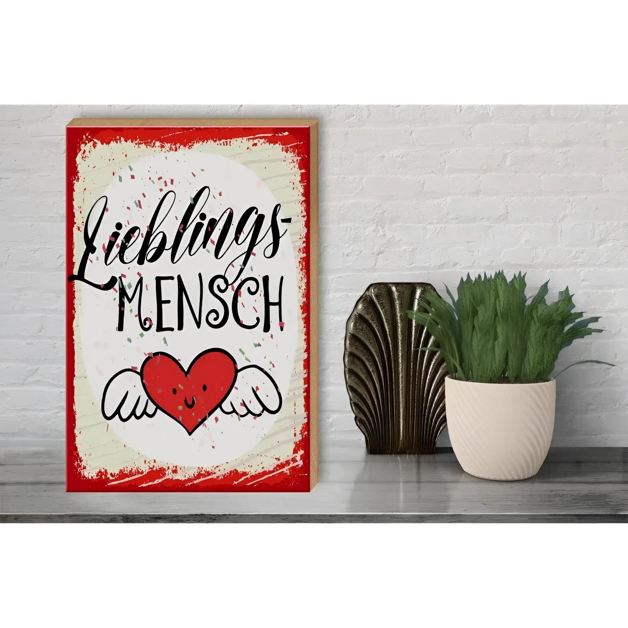 Rotes holzschild 30x40cm mit lieblings-mensch text und lächelndem herz mit flügeln auf leinwandprint