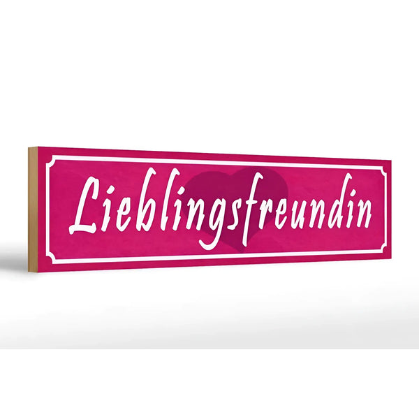 Ein pinkes holzschild 46x10cm mit weißer schrift lieblingsfreundin und herz als geschenk und dekoration