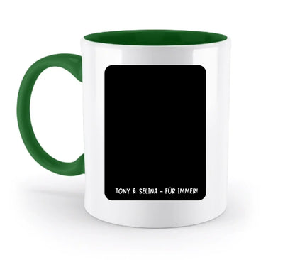 Weiße keramiktasse mit grünem griff und innenseite und schwarzem rechteck für individuelle textgestaltung aus der statement collection