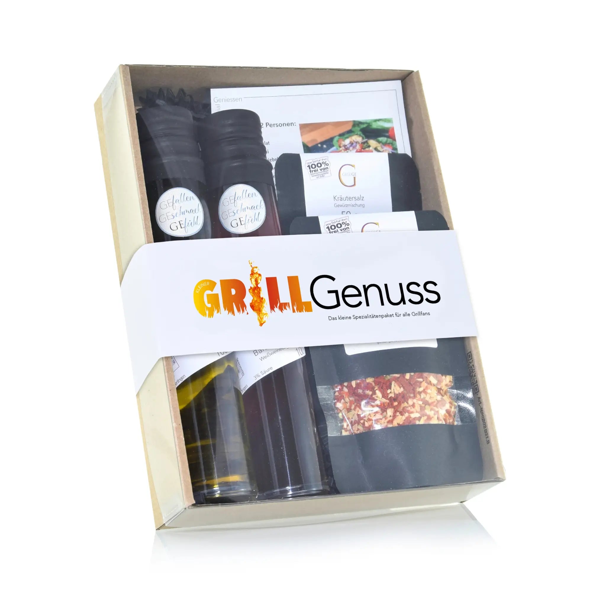 Kleiner grill genuss geschenkset mit grill essentials in schwarzen und klaren glasbehältern von grillgenuss