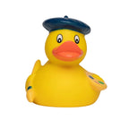 Gelbe badeente mit blauer baskenmütze und malerpalette als künstler und maler quietsche-ente