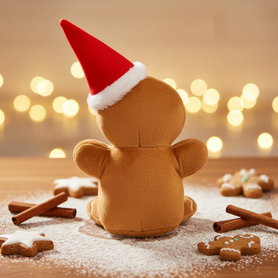 Ein kuscheliger laber lebkuchenmann ginny mit rotem weihnachtshut und weißen fellbesatz inklusive batterien