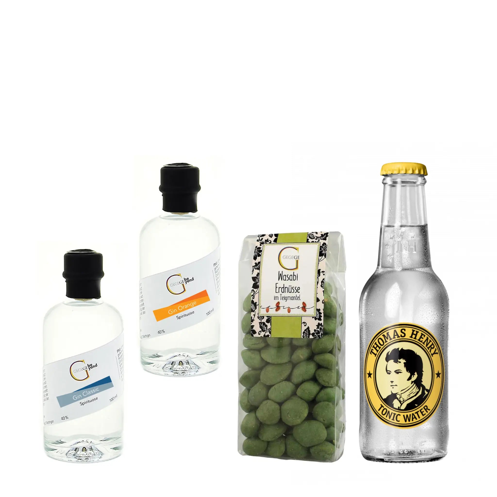 Klar glasflasche mit gelbem verschluss und goldenem etikett thomas henry tonic water im männer-paket geschenkset