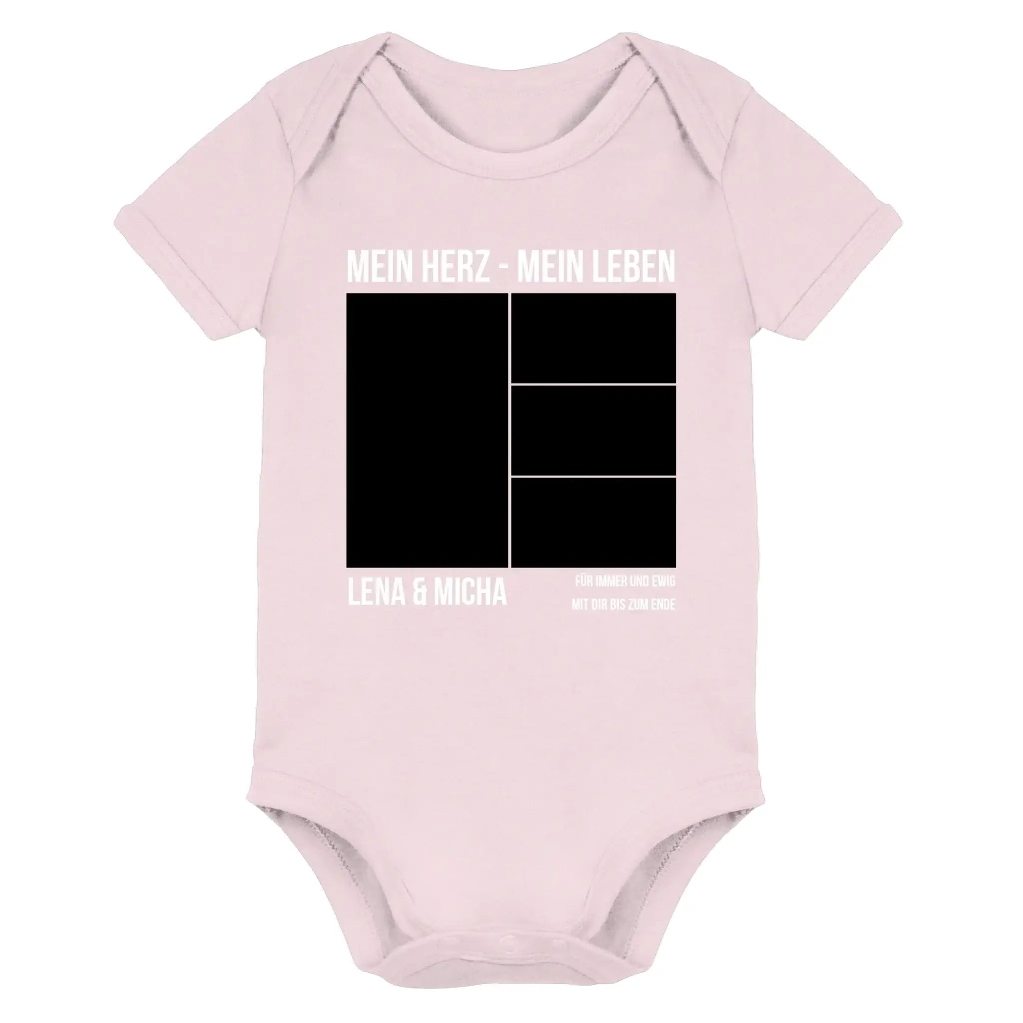 Ein weicher rosa babystrampler mit schwarzem weißem grafikdesign und dem text mein herz mein leben aus der statement-collection