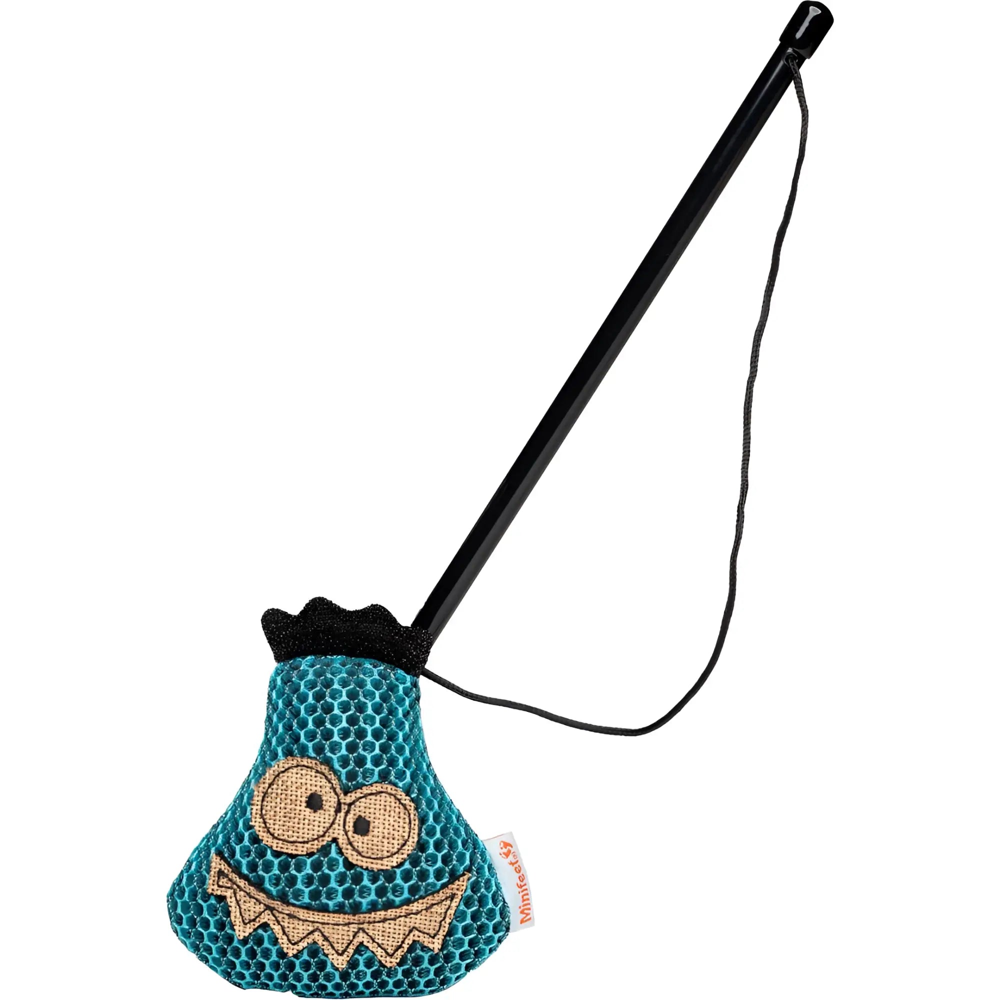 Teal monsterförmiges katzenspielzeug mit bestickten augen und zähnen an schwarzem griff miniFeet zora zahn plüschtier