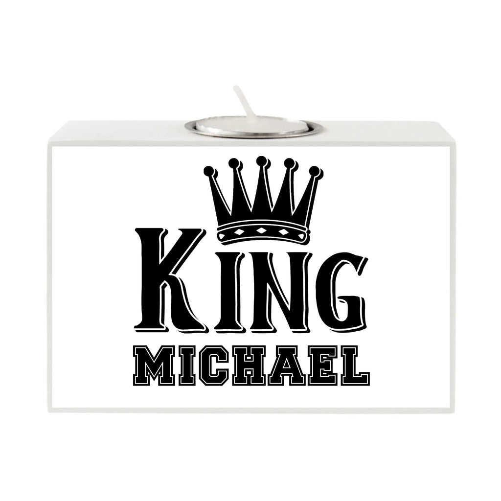 Weißer rechteckiger kerzenhalter king michael mit schwarzem schriftzug und kralle mit silbernem teelichtbecher oben