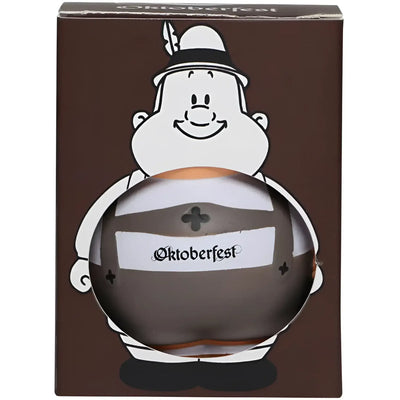 A glossy dark brown oktoberfest beer stein with white label and black cross in branded oktoberfest geschenkset packaging