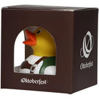 Gelbe rubberente in traditioneller oktoberfest lederhose mit grün weißen details und braunem gürtel mit silber emblem