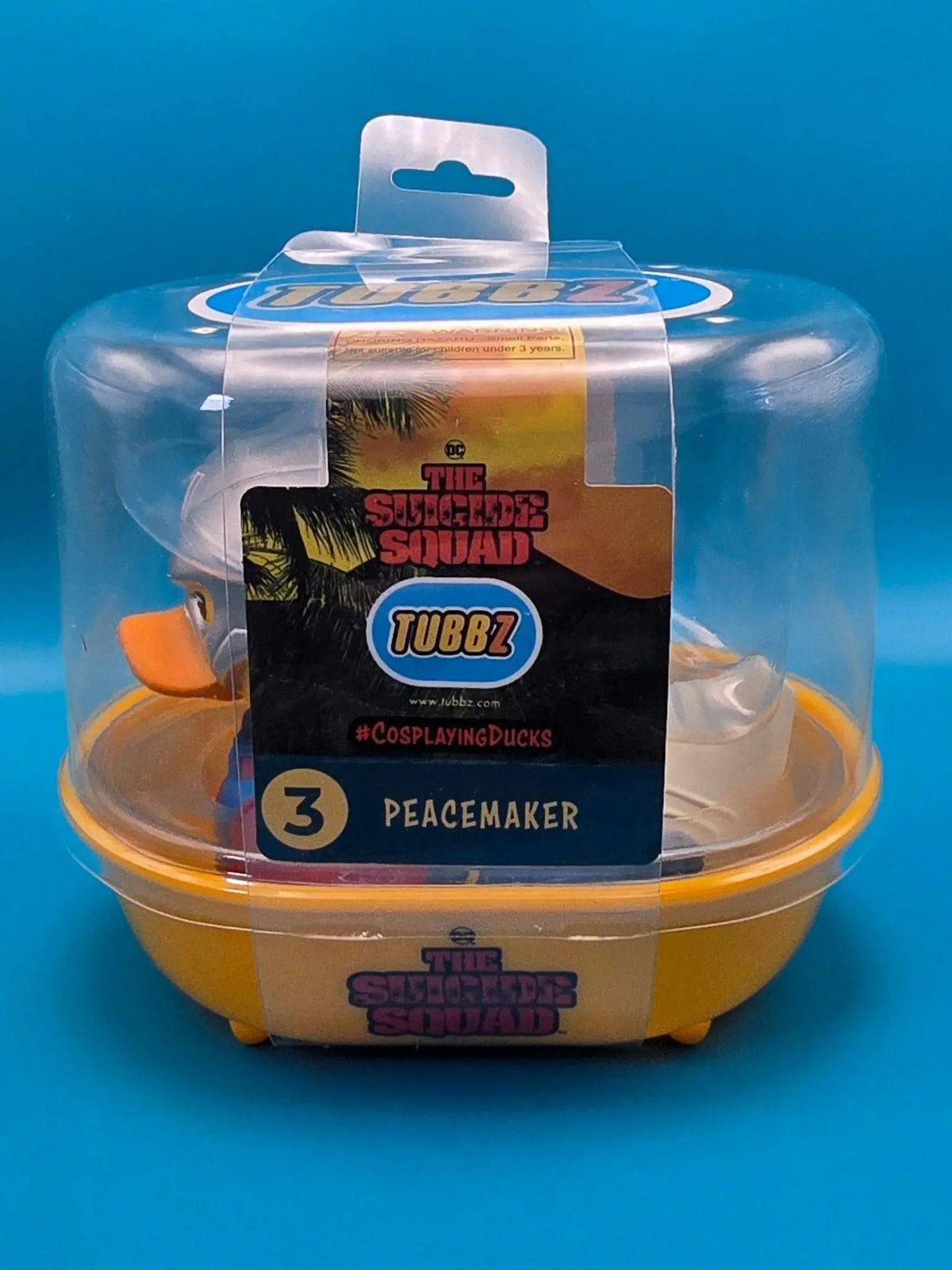 Gelber plastikbehälter mit weiß-orangeem peacemaker enten-tubbz pvc sammlerente offizielles suicide squad lizenzprodukt