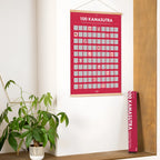 Ein rotes rubbelposter 100 kamasutra mit holzrahmen und 100 illustrierten feldern zum freirubbeln