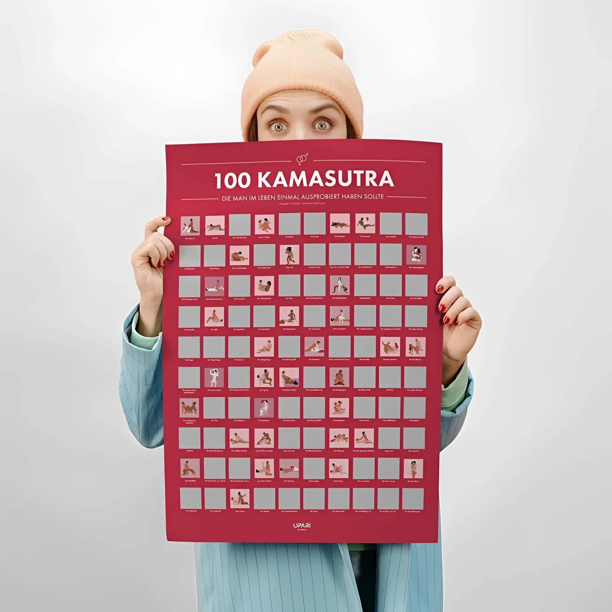 Ein leuchtend rotes 100 kamasutra rubbelposter mit illustrationen und silbernen feldern von upaki in deutscher version