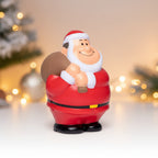 Rote und weiße plastik santa bert anti-stress-figur mit braunem sack über der schulter zum quetschen