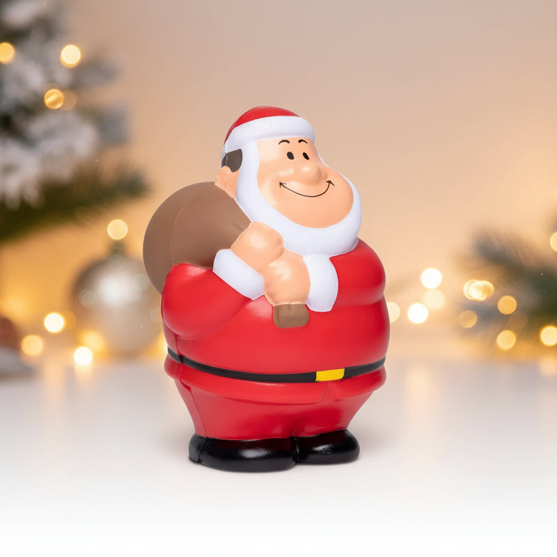 Rote und weiße plastik santa bert anti-stress-figur mit braunem sack über der schulter zum quetschen