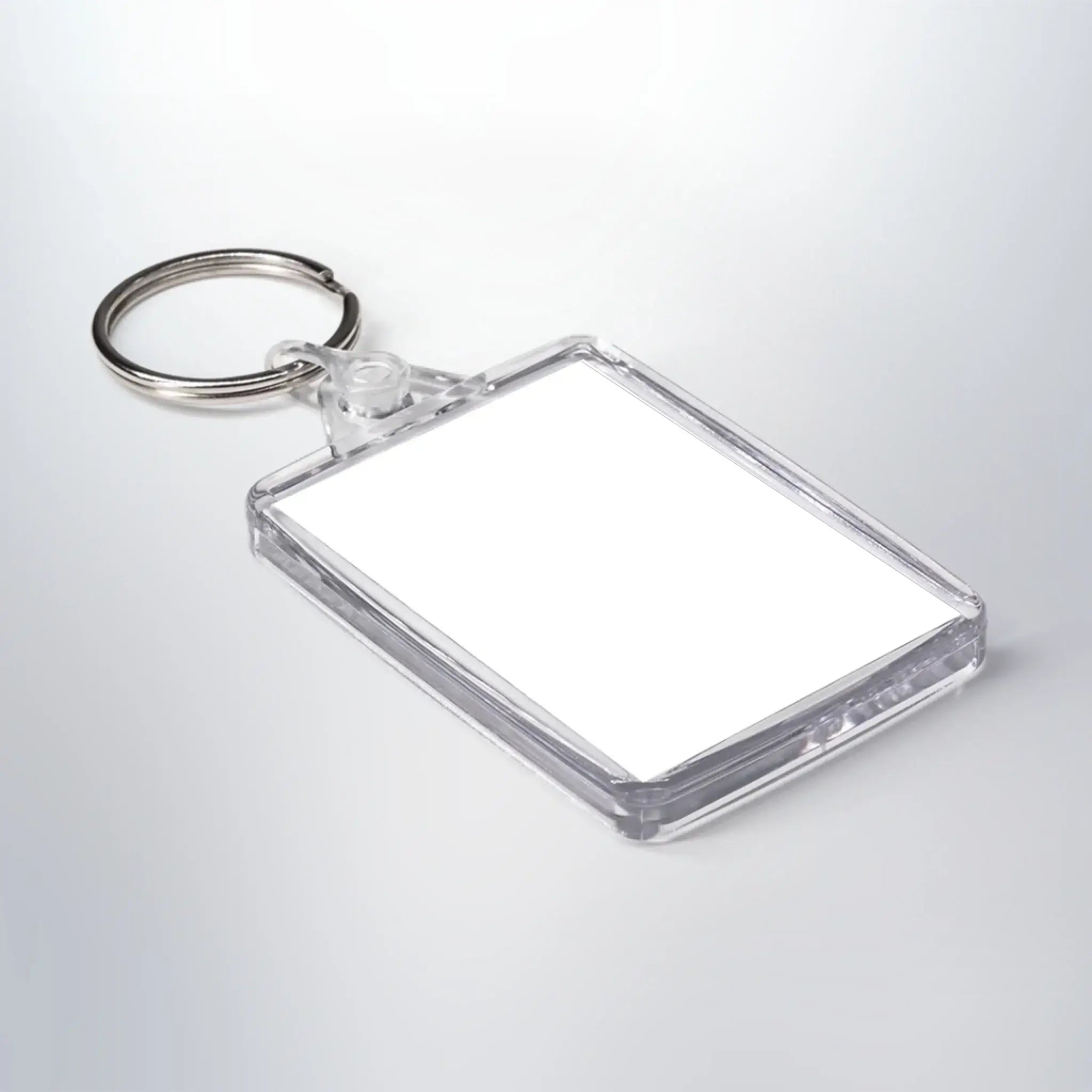 Klarer rechteckiger schlüsselanhänger mit silbernem ring beidseitig mit deinem bild bedruckt