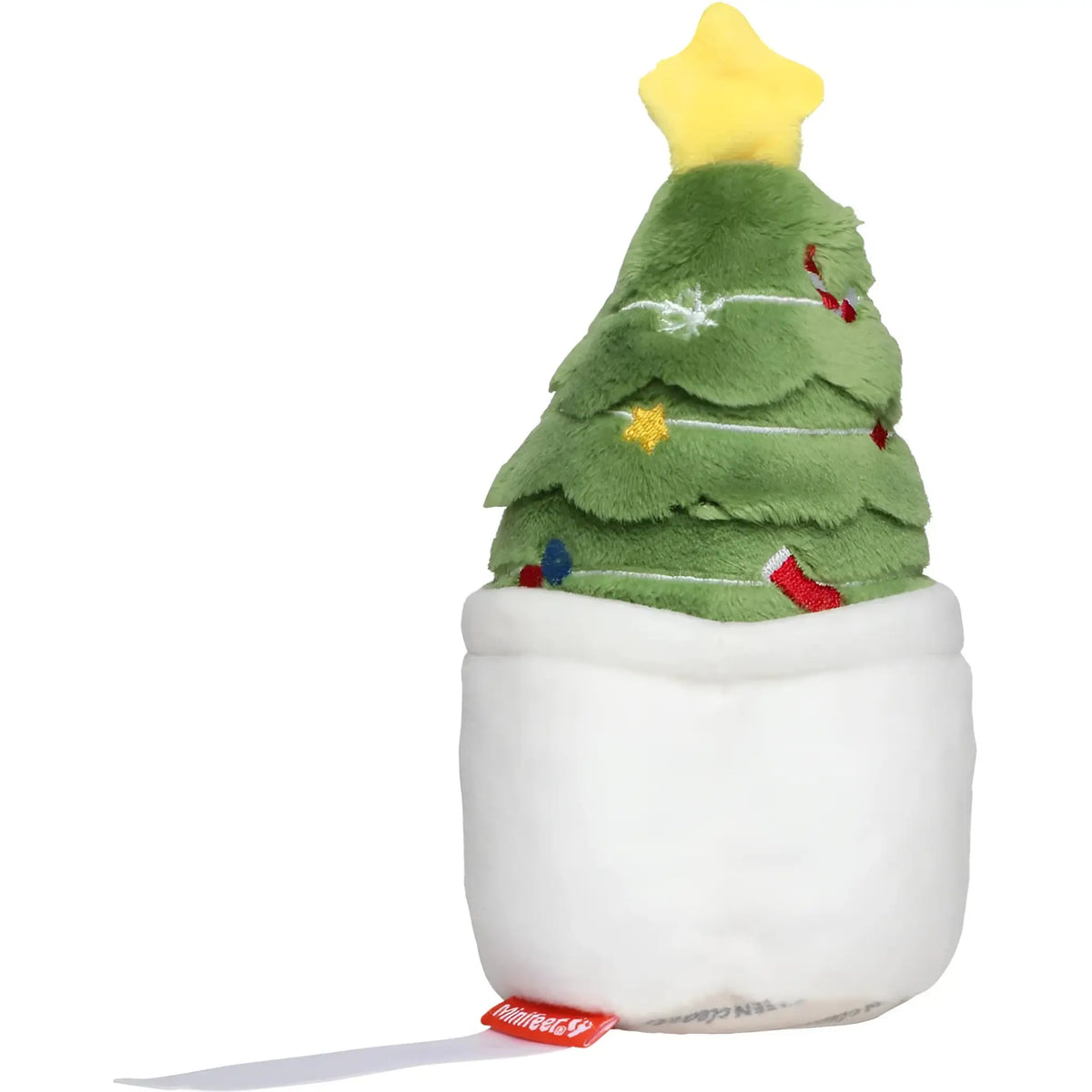 Ein grüner samttannenbaum mit gelbem stern und stickereien in einem weißen stoffsack von schmoozies evergreenies ideal als wichtelgeschenk