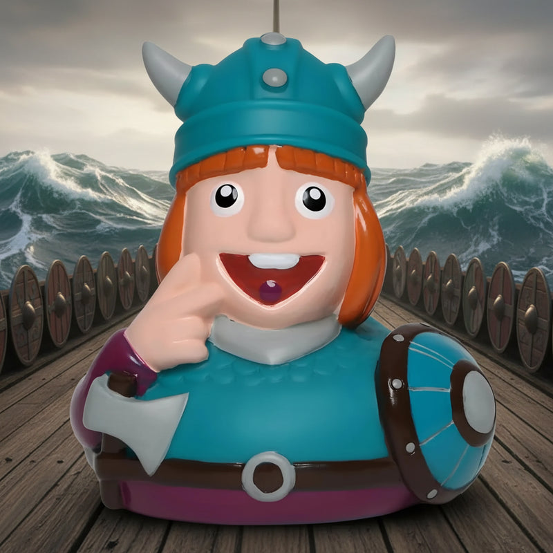 Petrolfarben und lila viking-themed schnabels badeente wickie mit grauen hörnern, axe und schild in geschenkverpackung