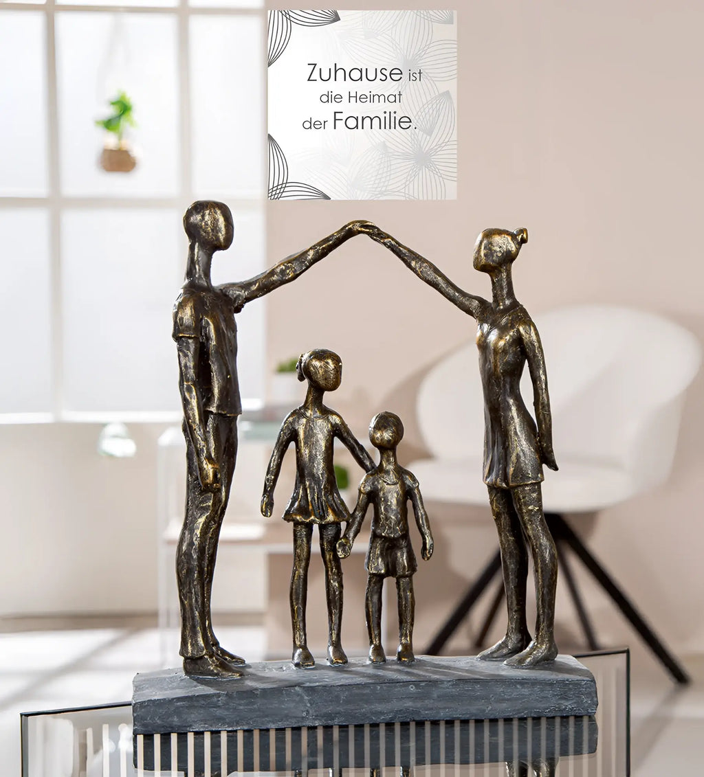 Bronze farbene familie skulptur schützende hand aus kunstharz in schwarz mit stilisierten figuren und kindern von gilde
