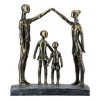 Bronze farbene abstrakte familie skulptur aus kunstharz mit stilisierten figuren über zwei kindern von gilde