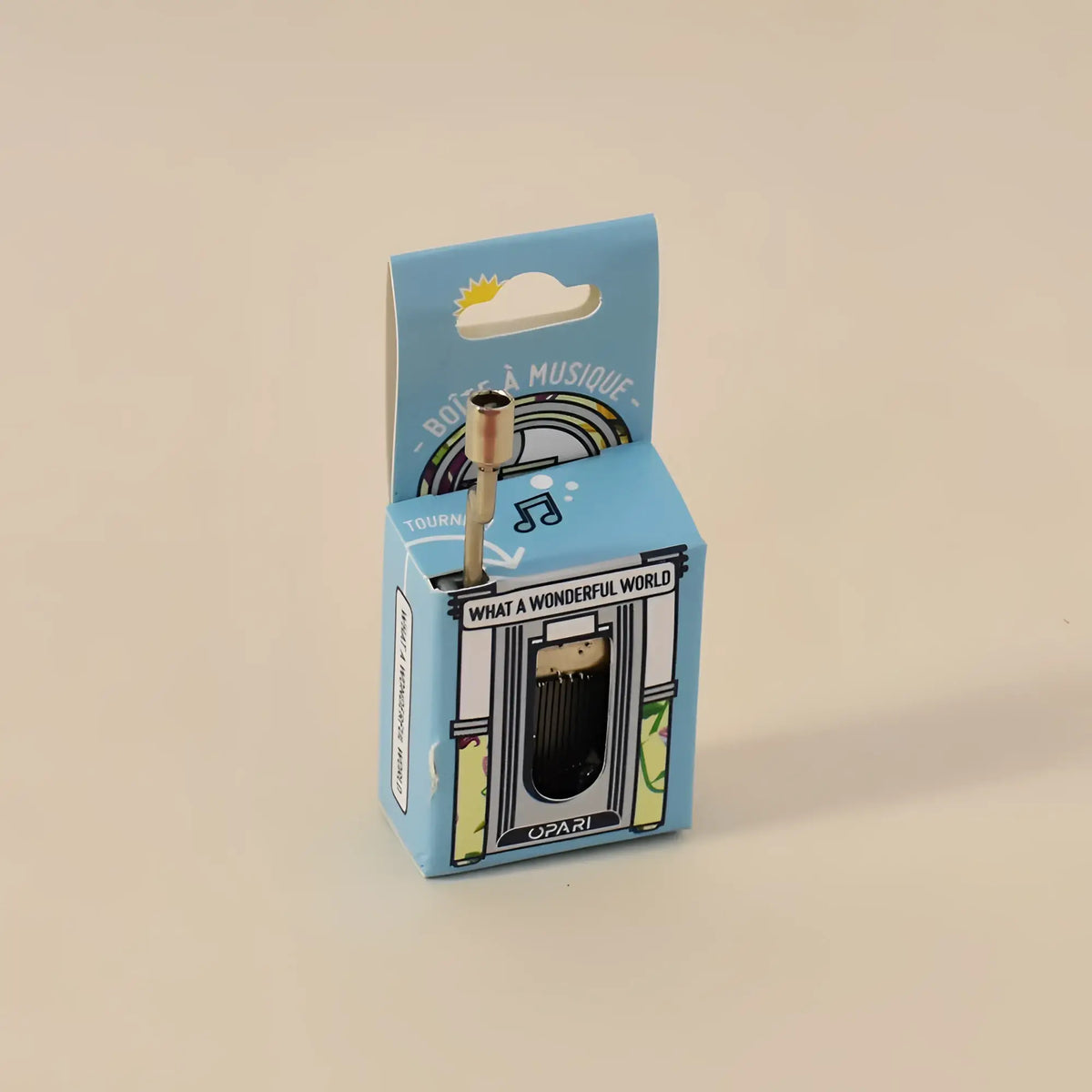 miniature brass spieluhr music box mit goldfarben top und schwarz Innenseite in Hellblau box mit musical notes und what wonderful world Text