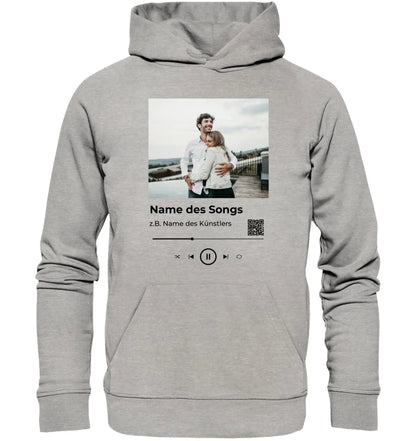 Ein heather grauer hoodie mit individuellem spotify musikplayer design und gedrucktem foto und songdetails