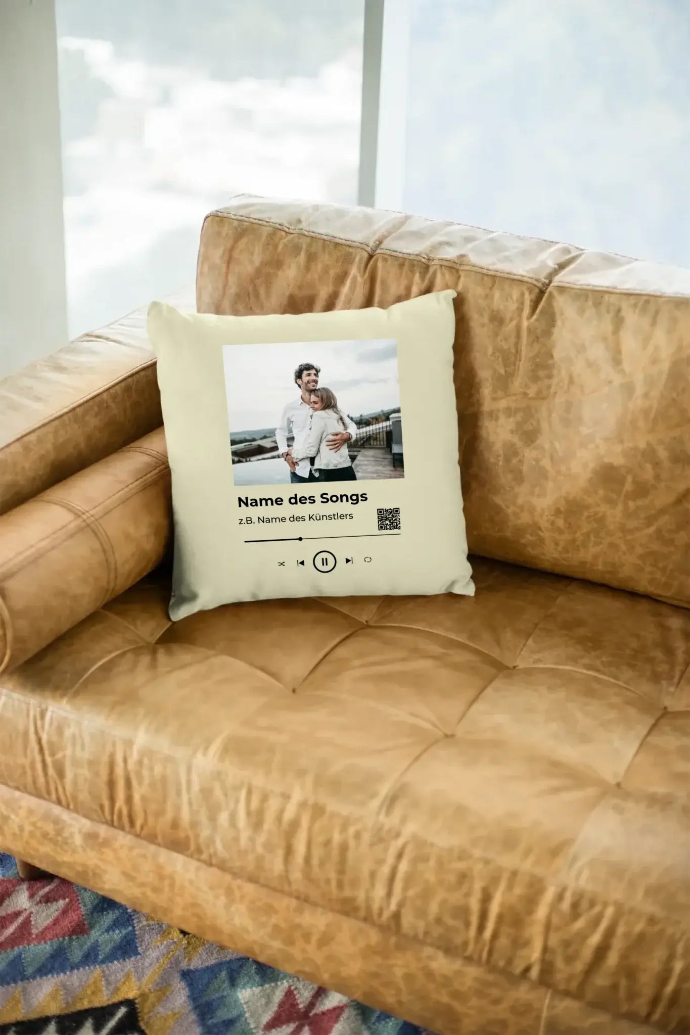 mockup-of-a-square-pillow-sitting-on-a-leather-couch-23551