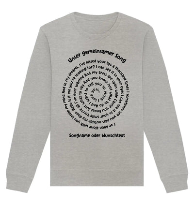 Ein hellgraues langarm sweatshirt mit schwarzem spiralförmigem spotify motiv und text unser gemeinsamer song auf der brust