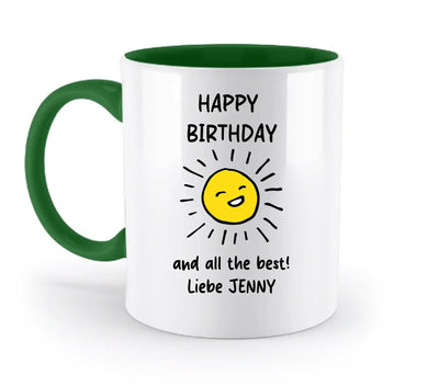 Weiße keramik tasse mit grünem griff und innenfläche mit lachender gelber sonne und text happy birthday aus der spotify-motiv 2 statement-collection