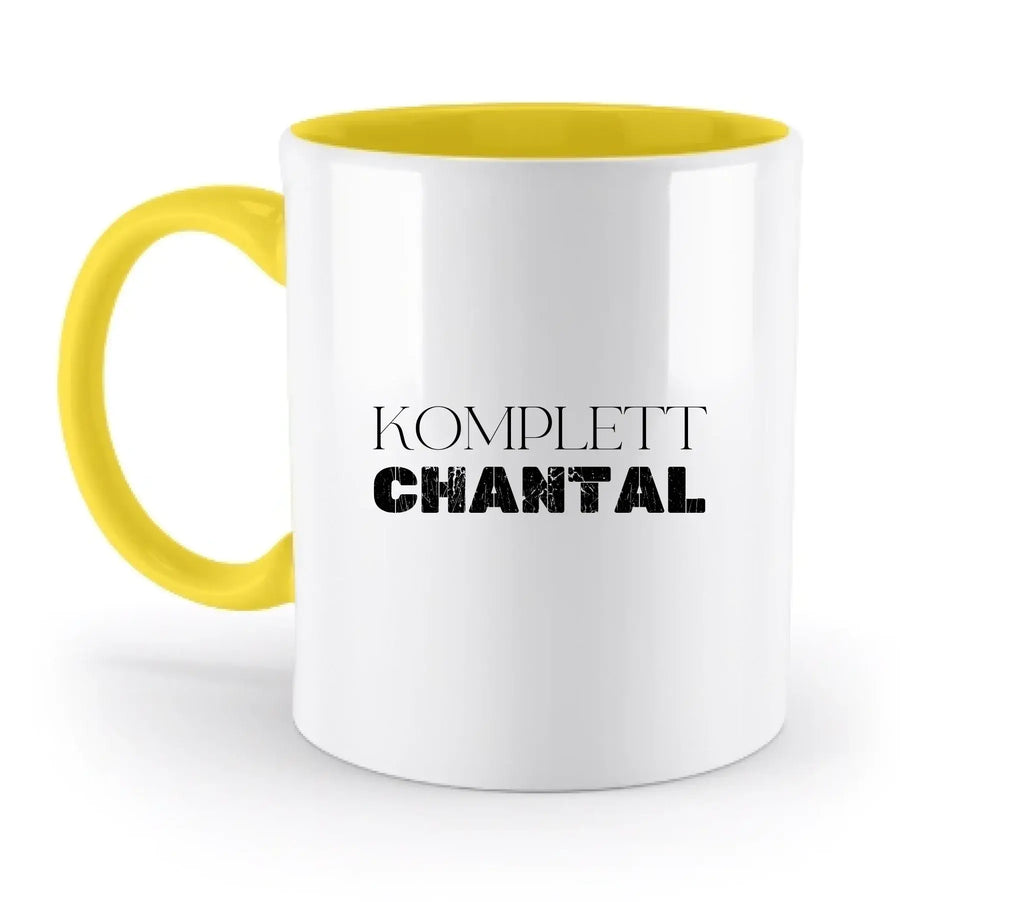 Weiße keramikmug mit gelbem griff und innenbereich mit dem text komplett chantal aus der statement-collection