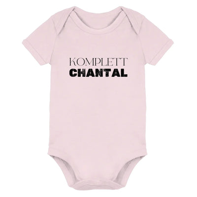 Pale pink baby onesie with komplett chantal printed in bold black from sprüche mit namen statement collection
