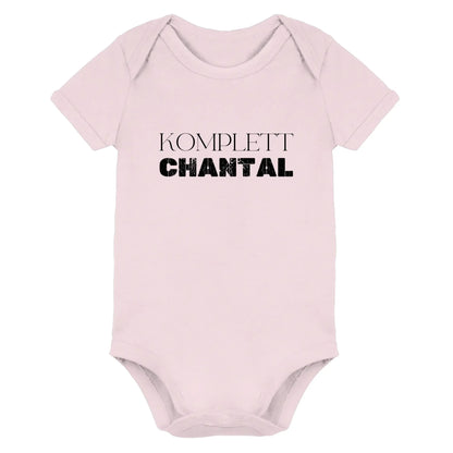 Pale pink baby onesie with komplett chantal printed in bold black from sprüche mit namen statement collection