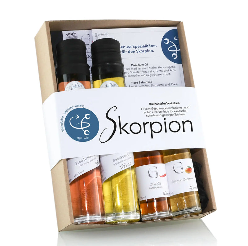 Sternzeichen-set skorpion präsentkorb mit vier bunten glasflaschen aromatischer öle und soßen