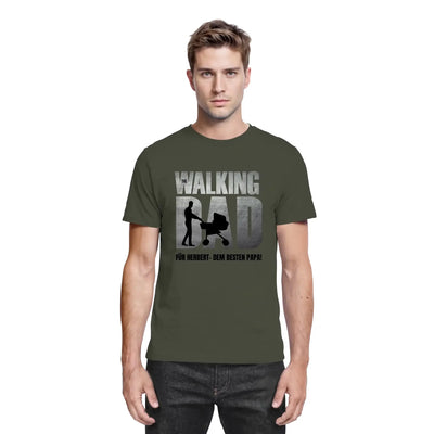 Olivegrünes baumwoll t-shirt mit walking dad motiv und silhouette eines papi mit kinderwagen aus der statement collection
