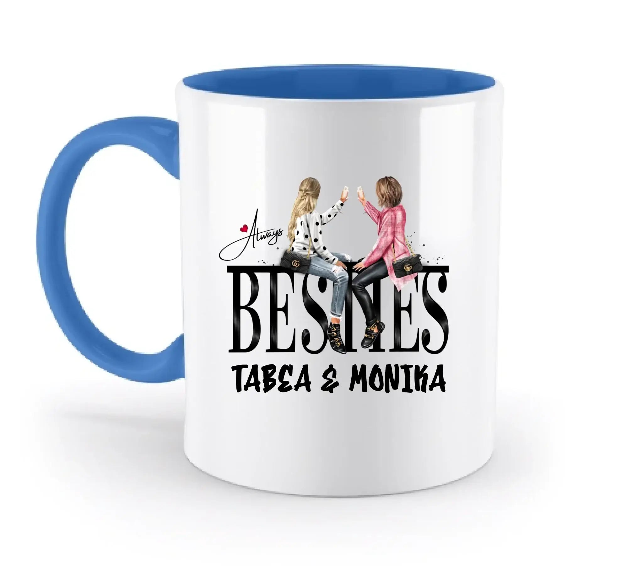 Weiße keramikmug mit blauem innenraum und henkel, farbige illustration von zwei frauen auf taschen und text besties tabea & monika