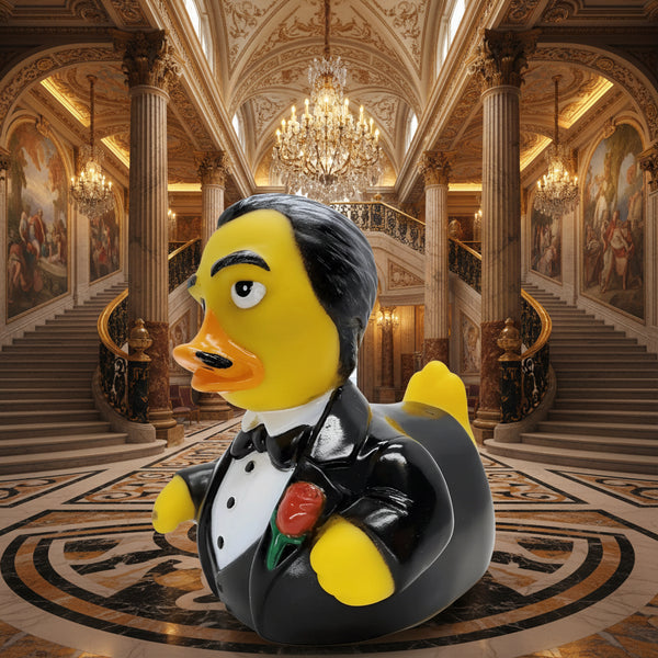 gelbe gummiente im schwarzen smoking mit weißem hemd und roter rose das offizielle godfeather produkt von celebriducks