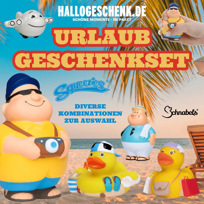 Gelbe badeente mit blauen sonnenbrillen und gestreiftem strandtuch als urlaub geschenkset quetschfigur