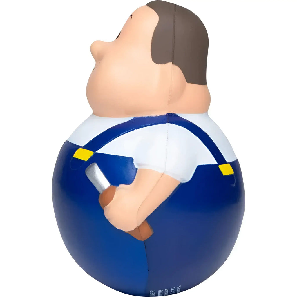 Blue und weiße stressball-figur wackel schrauber bert mit braunen haaren und magnet im overalls