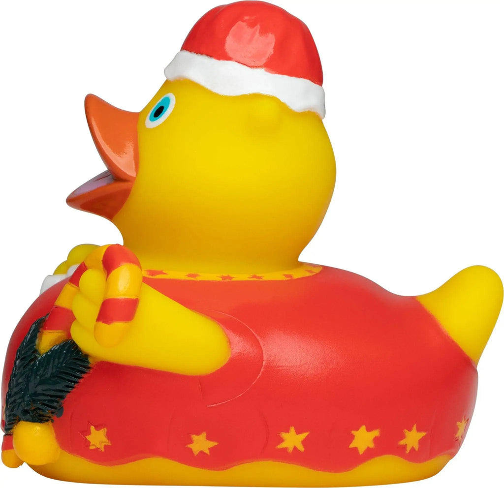 Eine gelbe quietsche-ente in weihnachtlichem roten outfit mit goldenen sternen und einer weihnachtsmütze